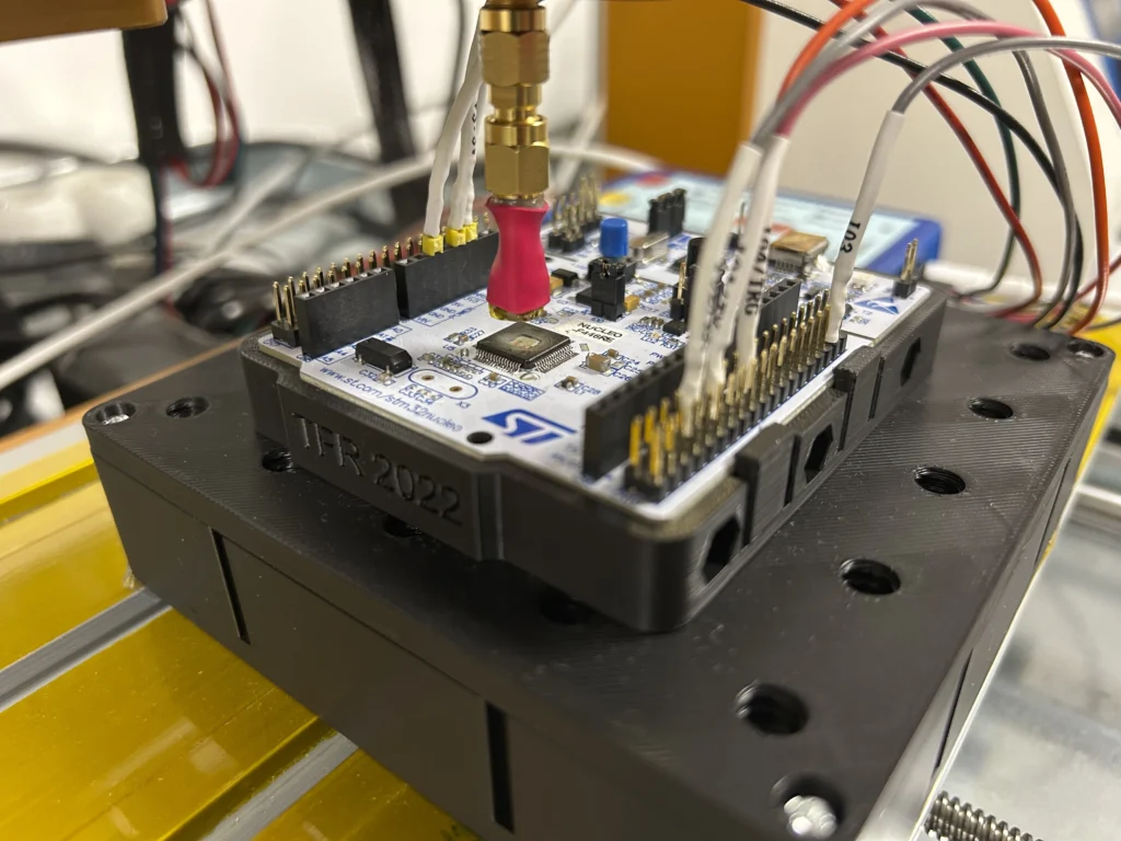 An electromagnetic station, with a chip in its center.